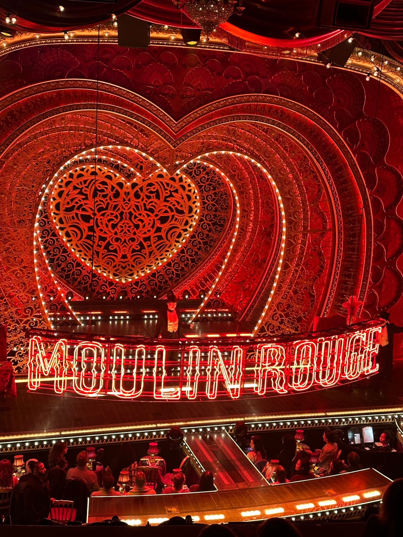 Inside a Broadway theatre before the show